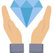 A pair of hands holding a diamond
