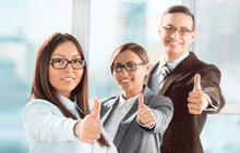 three partners with thumbs up